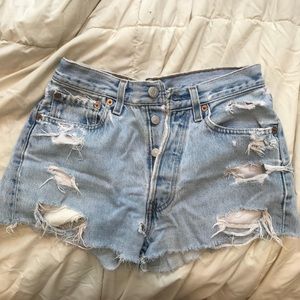 Vintage Levi’s Destroyed Denim Shorts in Lightwash